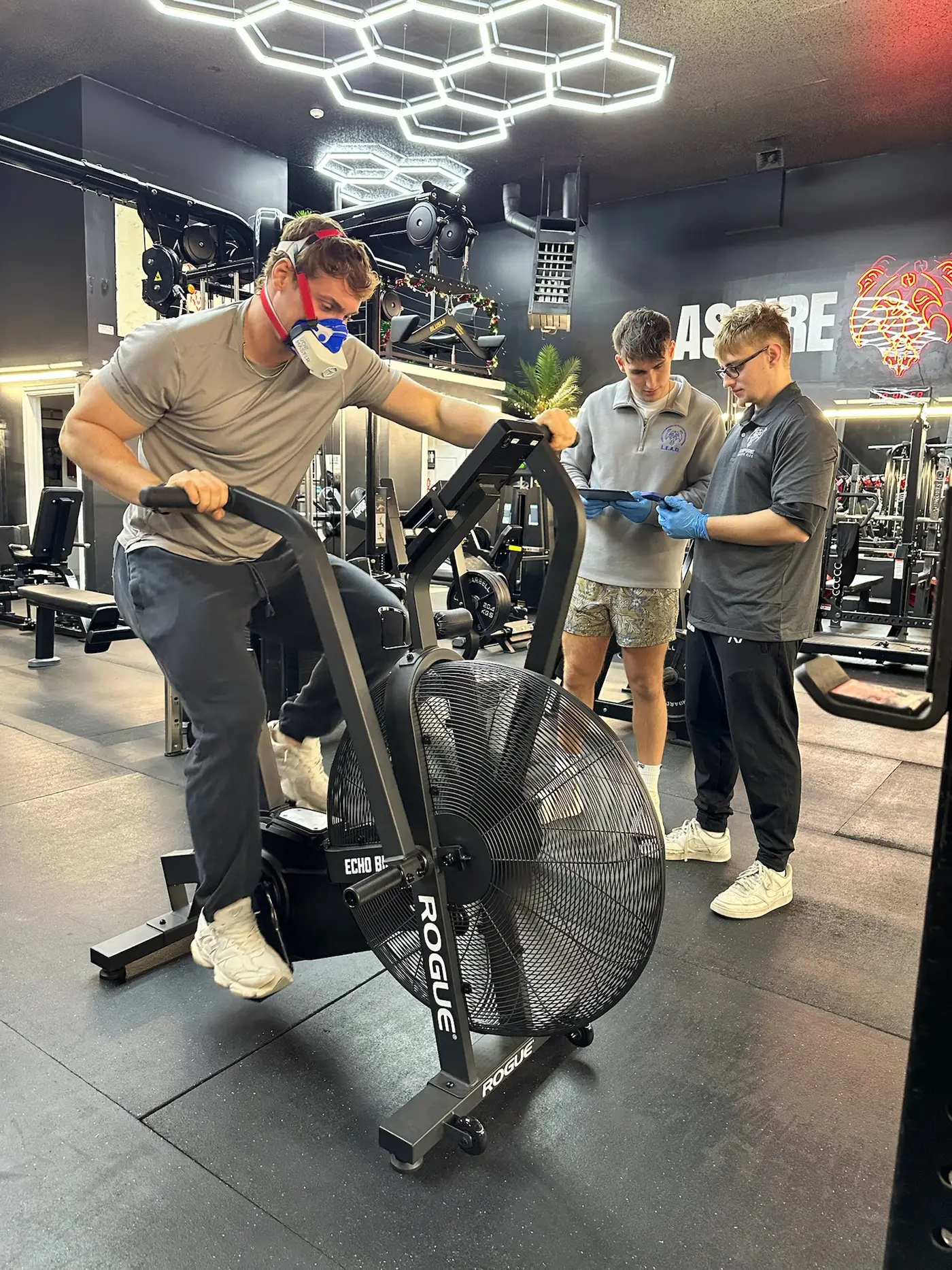 Aspire coaches guiding a member through metabolic testing